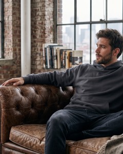 Man_relaxing_on_leather_sofa_202607301440